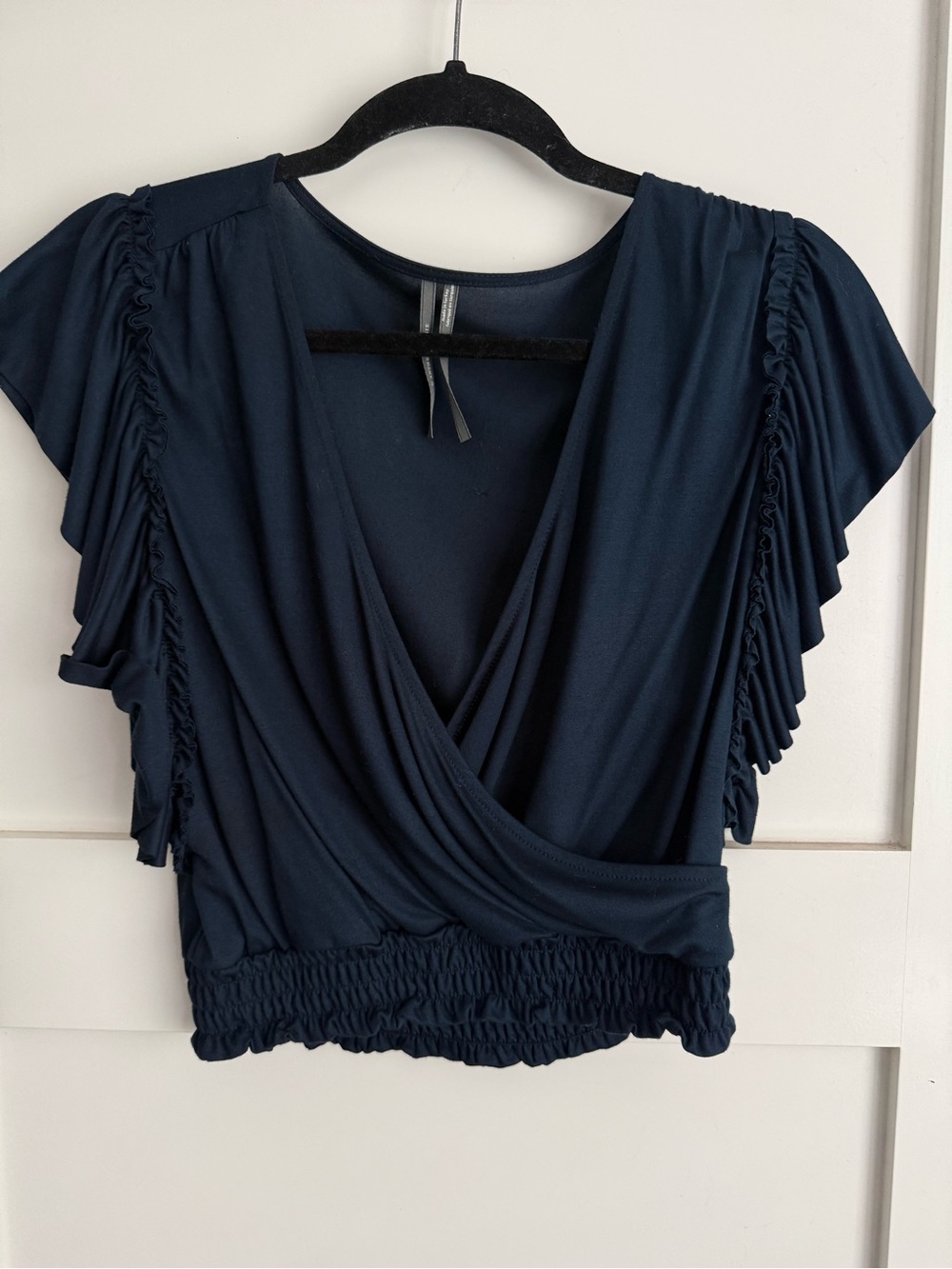 Anthropologie ruffled sleeve wrap top